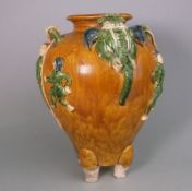 An Oriental sancai glazed pottery vase: in Tang-style, applied with elephant heads,