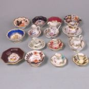 Seven English porcelain miniature jug and basin sets and one other: decorated variously comprising