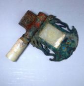 A Chinese hardstone mounted bronze ax head: in archaic style,