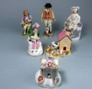 A group of pearlware and other porcelain figures: of children with animals together with a kennel
