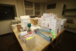 Assorted Lab Supplies including Test Tube Holders, Freezer Packs, Syringes, Mixer, Plastic