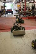 (2) (2) John Deere 180A walk behind lawn mowers complete with grass catchers. Used for Tee Box and