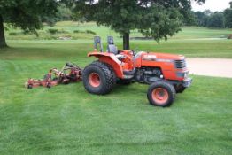 Kubota M5400 tractor w/tow behind mower