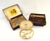 A Demar pearl simulated necklace, Castles printing set,