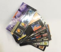 Blue bag with extensive GB mint stamps on presentation cards and in blue album,