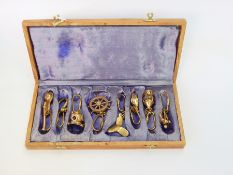 Nautical key rings to include a bosun's whistle, diver's helmet, wheel,