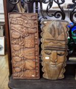 Tribal hardwood hanging mask and tribal hardwood carved plaque depicting tribespeople