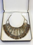 Egyptian 18th dynasty faience bead necklace of multi-coloured and varying length beads,