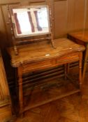 Oak folding swivel top tea table, with two frieze drawers,