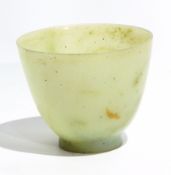 Small Chinese pale celadon jade bowl with flared sides and circular foot, 5.