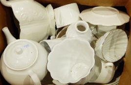 White porcelain shell-shaped dish marked 