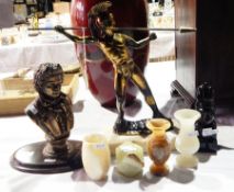 A bronzed figure of a Greek god, possibly the God of War throwing a javelin, on a marble base,