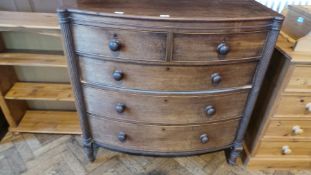 Early 19th century mahogany bow front chest of two short and three long graduated drawers flanked