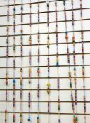 A beaded and knitted curtain