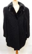 A Persian lamb three-quarter length jacket with a black mink collar