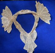 A pair of Victorian pantaloons with broderie anglaise, two lace collars, lace-trimmed handkerchiefs,