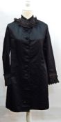 A Victorian black satin cape embroidered with faux-jet beads,