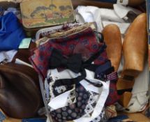 A pair of shoe lasts, various white pique evening waistcoats, a collection of cravats, bow ties,