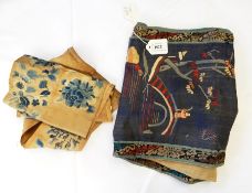 A pair of Chinese embroidered silk panels showing figures on a bridge with trees,