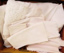 A quantity of table linen including a large cut and drawn thread tablecloth (unfortunately stained,