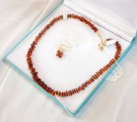 A necklace and earring set made from Baltic amber and gold plated sterling silver,