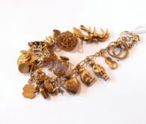 A 9ct gold bracelet with quantity gold charms, 34g total approx.