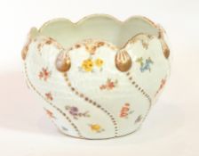 A Dresden bowl, marked on base, wavy edge,