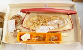 Costume jewellery, faux pearls, a Cornelian brooch, two other brooches,