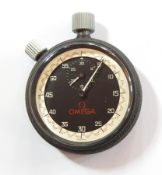 An Omega stopwatch with black dial, the minute sweep and with 30 second subsidiary dial, Swiss made,