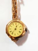A lady's 9ct gold cased wristwatch, the enamel dial with Roman numerals,
