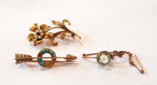 A 9ct gold, garnet and cultured pearl brooch in the form of a flower,