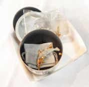 A Swarovski brooch of leaping dolphins in original box, a Swarovski basket of flowers,