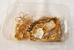 A gold colour necklace with dark blue enamel leaf style links,