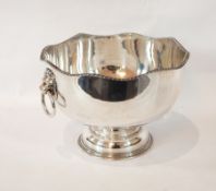 An EPNS punch bowl with lion mask, holding rings,