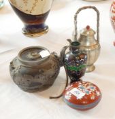 A Chinese pewter overlaid teapot, another metal teapot,
