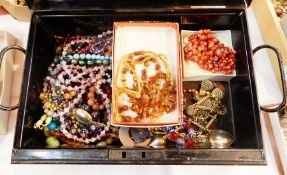 A string of amber nugget beads,