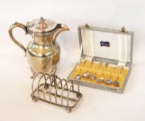 A quantity of silver plate including flatware, coffee pot, a pair of wine coasters, a toast rack,