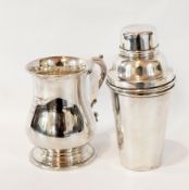 An EPNS teapot with repousse decoration, a cartouche with initials,