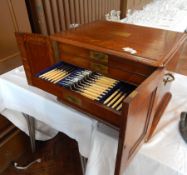 An oak table canteen of five graduated drawers,