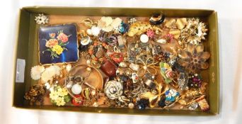 A large quantity of costume jewellery including necklaces, brooches, earrings,
