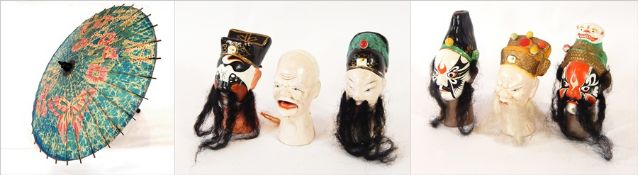 An Eastern lacquer bamboo painted sunshade together with a small collection of Chinese puppet heads