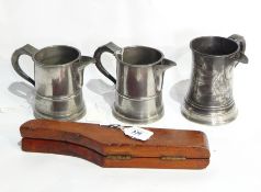 Three 19th century pewter measures,