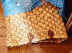 A quantity of Moroccan graduated sets of three baskets with leather handles