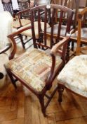 A carvers chair with stick back,