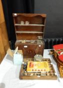 A child's kitchen dresser with various miniature items viz: sewing machine and a quantity of teddy