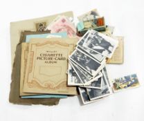 Collection of cigarette cards, Continental money, Prada glasses, Post Office Savings Bank money box,