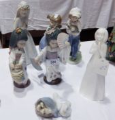 A Lladro porcelain goose with goslings,