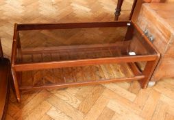 An Arts & Crafts style glass-topped coffee table,