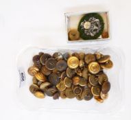 A large collection of military buttons