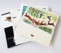 Two USA albums of mint and used stamps including sheets, 10 USA year books (1995-2014),